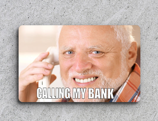 a picture of a smiling man holding a phone
