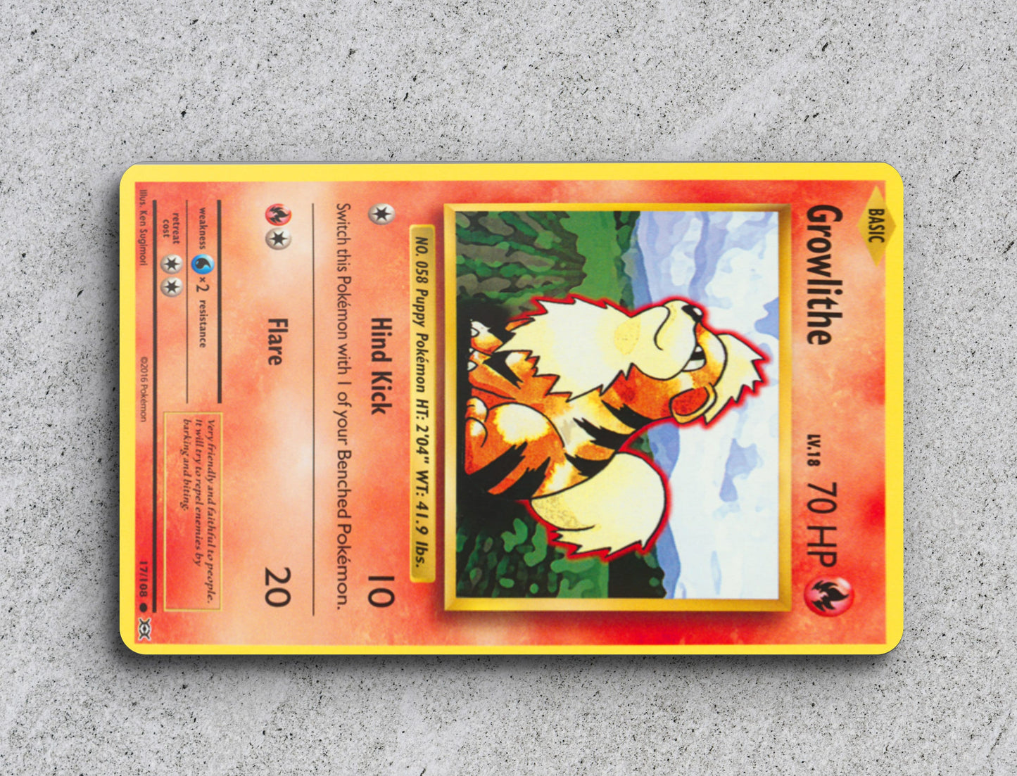 a pokemon trading card sitting on top of a table