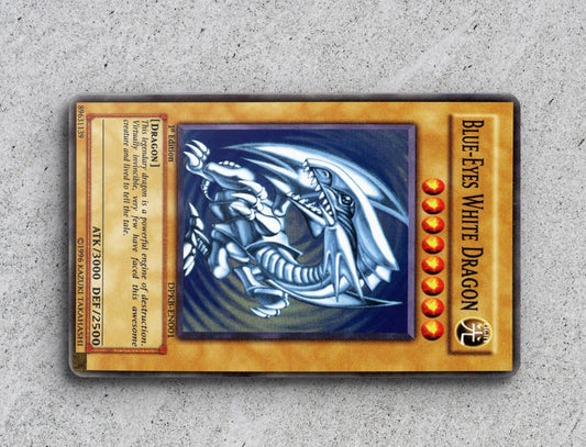 a close up of a pokemon card on a table yu-gi-oh