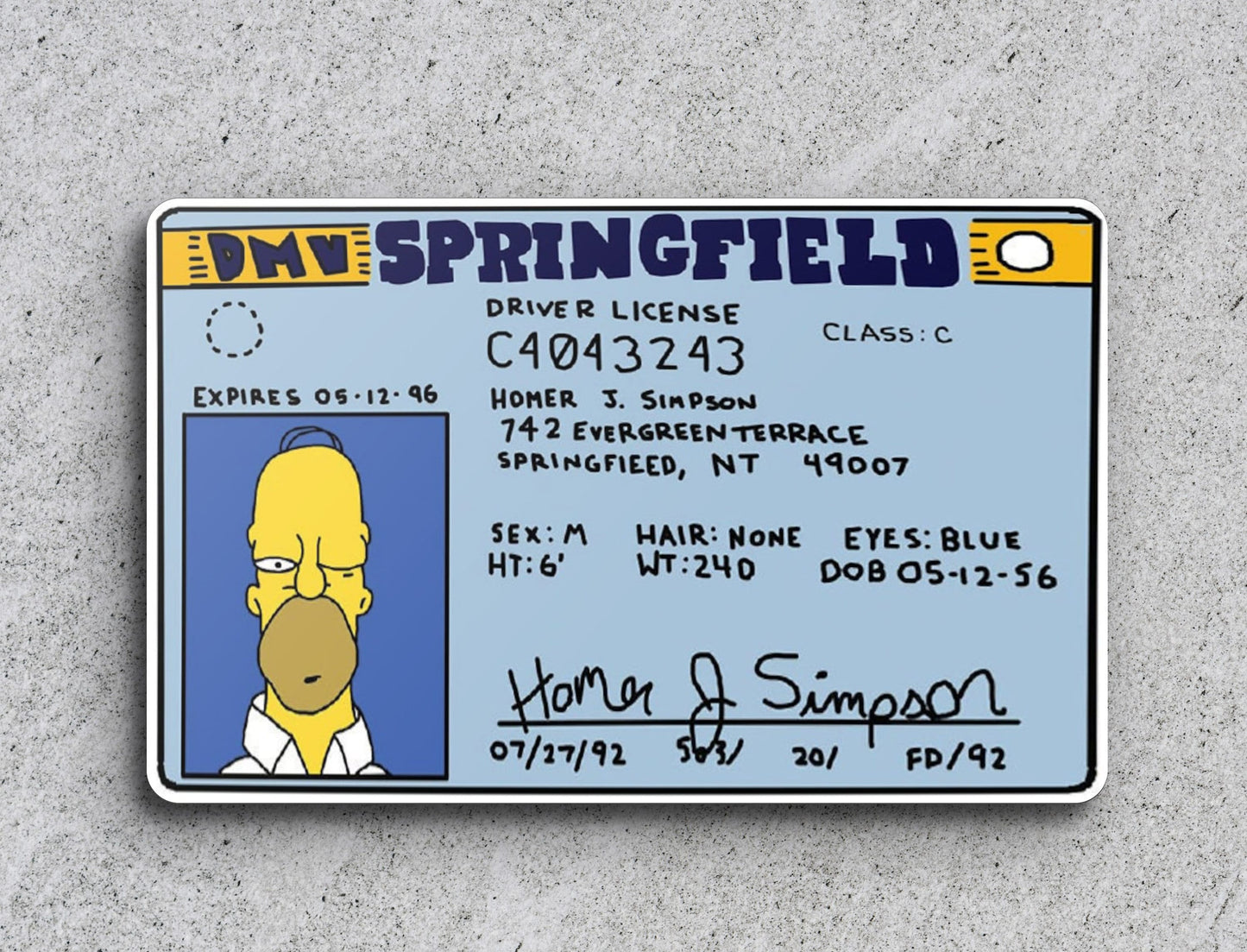 a simpsons id card with a picture of homer simpson